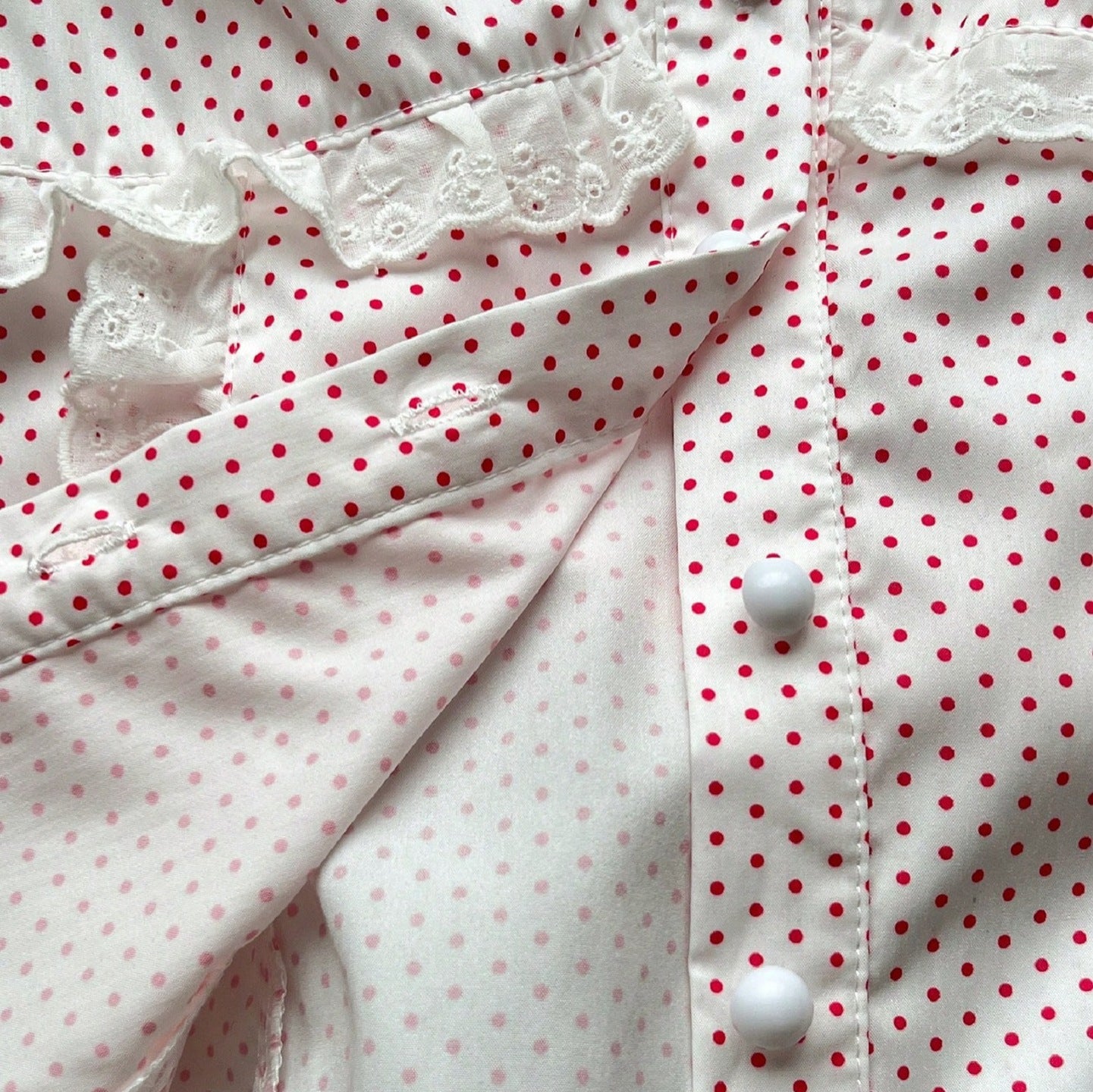 Polka strap waist cinching short sleeved top