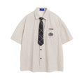 Embroidered striped short sleeved pocket