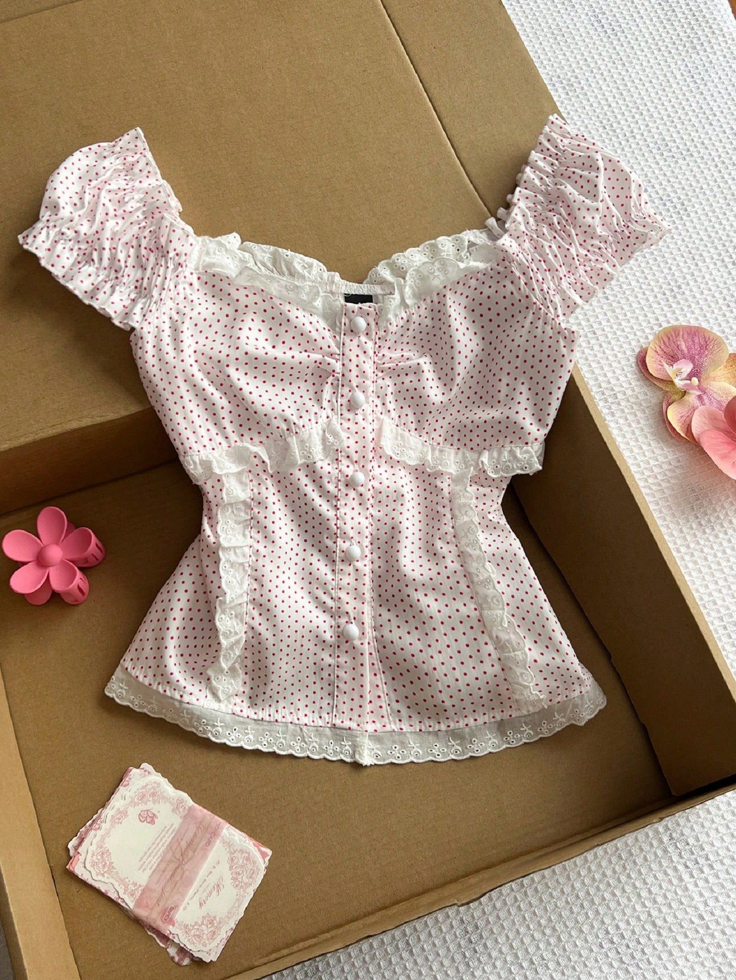 Polka strap waist cinching short sleeved top