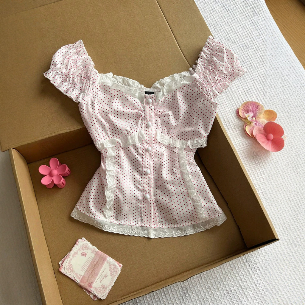 Polka strap waist cinching short sleeved top