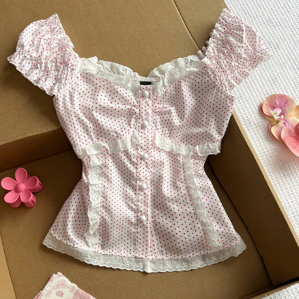 Polka strap waist cinching short sleeved top