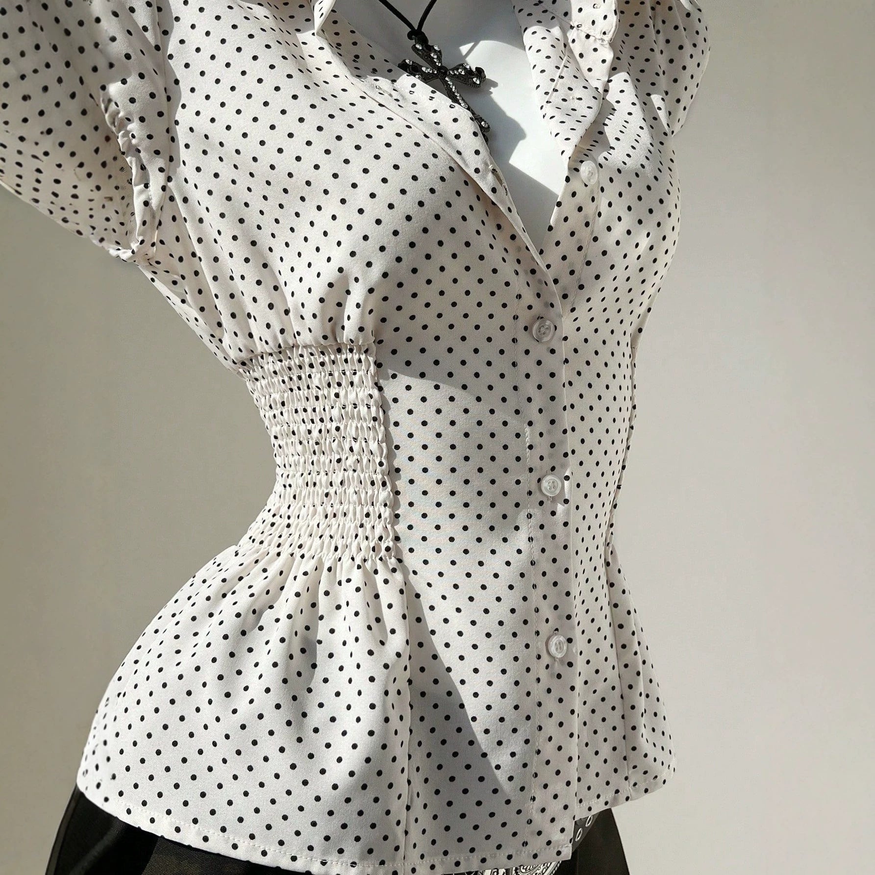 Wave point waist cinching women's shirt