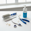 Dog grooming kit with brush, comb, nail clippers, scissors and shampoo